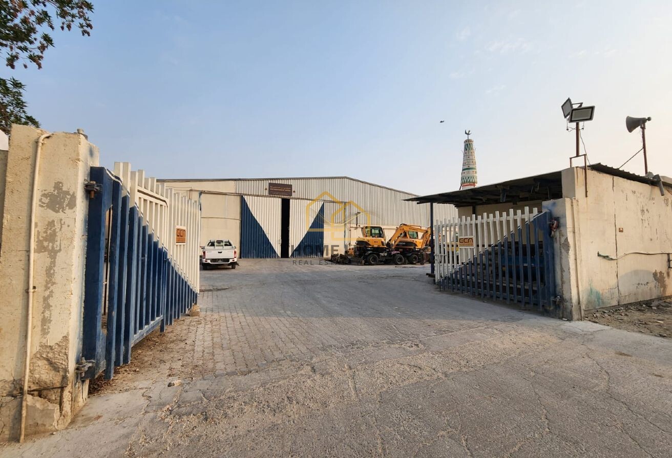 BIG STORE WITH WORKERS HOUSING IN INDUSTRIAL AREA